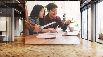 Three asian businessman working and discussing business together in a meeting Wall mural