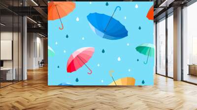 Umbrellas seamless pattern vector illustration. colorful umbrellas with raindrops on blue background. Wall mural