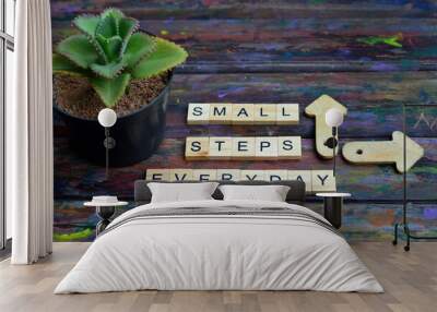 small step everyday text on wooden square, business and inspiration quotes Wall mural