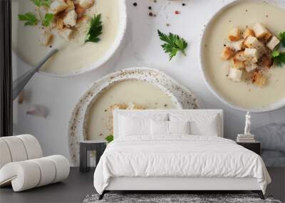 cauliflower potato soup puree on white marble tabletop, Creamy cauliflower soup with toasted bread croutons. Vegetarian healthy food concept. Ideas and recipes for winter meal. Top view or flat lay Wall mural