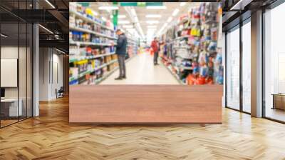 Wooden empty table in front of blurred supermarket Wall mural