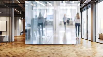 Blurred modern office interior with people working in the background Wall mural