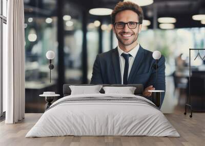 Portrait of successful boss, businessman in business suit looking at camera and smiling, man with crossed arms working inside modern office building Wall mural