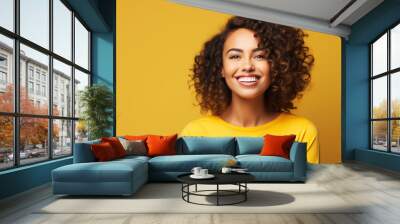 A happy Hispanic woman in her 30s smiling brightly Wall mural