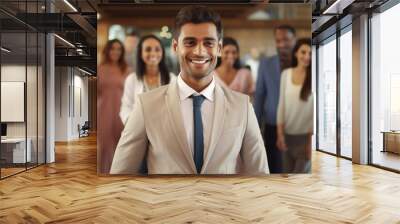 Indian businessman with colleagues in his office Wall mural