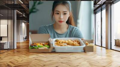 Asian woman with takeaway food and drinks at home. consumption eating home delivery food. enjoying delicious takeaway delivery tasty meal. generative ai Wall mural