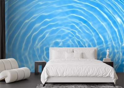 Abstract blue water ripple surface. Transparent clear water wave on blue background. Sunlight on surface of water. Natural summer shining pattern texture background. Mockup for product or spa concept Wall mural