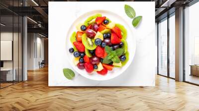 Top down view of vitamin fruit salad Wall mural