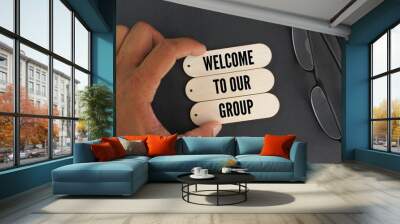 glasses and sticks with the words welcome to our group. new member concept. HR concept Wall mural