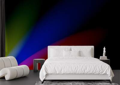 three beams of red, yellow, blue lights from the edge with a dark background. Gradient background. Additive color mixing with three spotlights Wall mural