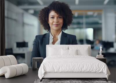 Portrait of middle aged African-American business woman in office setting, 40-45 years old office worker wearing a gray suit, confident professional, ceo, photo created with generative AI Wall mural