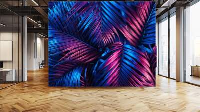 Creative fluorescent color layout made of tropical leaves. Flat lay neon colors. Nature concept. Wall mural