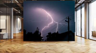 Lightning strike over a countryside house in night Wall mural