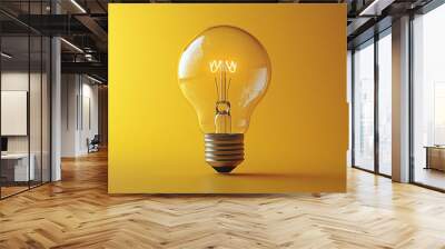 yellow solid background with single Light bulb. New ideas sparking growth, focus cover main object, front view focus, copy space for text. Wall mural