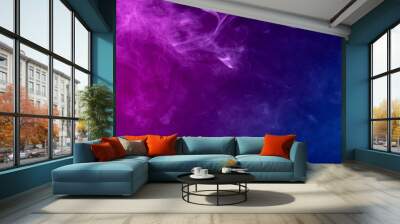 Abstract colorful smoke on black background . Wall mural