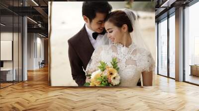 couple wedding photograph session on the beach Wall mural