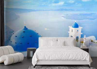 Greece, Santorini island in Aegean sea. Breathtaking scenery with blue domed church on foreground and epic island panorama in background. Wall mural