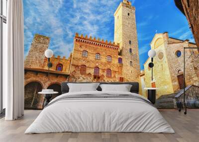 Picturesque View of famous Piazza del Duomo in San Gimignano at sunset, Tuscany, Italy Wall mural