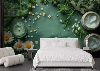 Natural organic cosmetics set with chamomile buds on green background flat lay Wall mural