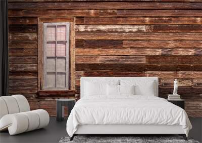 Old western style rustic wooden exterior wall with a framed window Wall mural