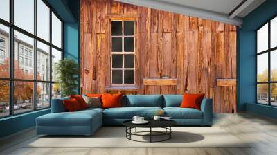 Rustic wooden exterior wall with a framed window Wall mural