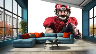 A football player in a red jersey and helmet holds a football in his hands. Wall mural