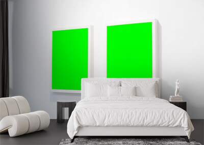 Empty picture frames on a white wall template. Mockup for two photos in a domestic space. Interior decoration at home in a modern environment. Wall mural