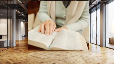 Studying, bible or hands of woman in church ready to worship God, holy spirit or religion in Christian cathedral. Faith closeup, learning or lady reading book in chapel praying to praise Jesus Christ Wall mural