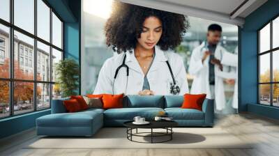 Tablet, doctor and woman typing, reading or research medicine study, cardiology info and healthcare data. Team review, hospital manager and medical surgeon, nurse or clinic worker search web database Wall mural