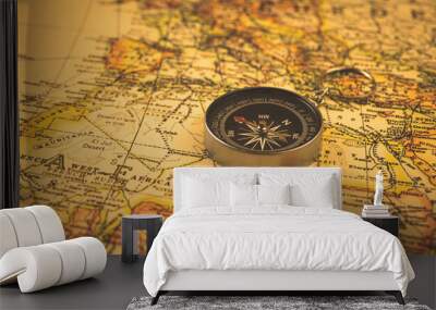 Antique compass on vintage africa travel map, exploration and navigation concept background photo Wall mural