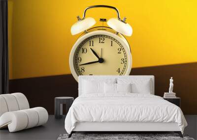 Retro alarm clock on wooden table, bright morning concept about the time Wall mural