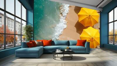 Top view of a yellow beach umbrellas lined up on sandy shore by the turquoise ocean. Minimal summer concept. Wall mural