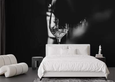 Glass of rose and white wine seen in close hand. Wall mural