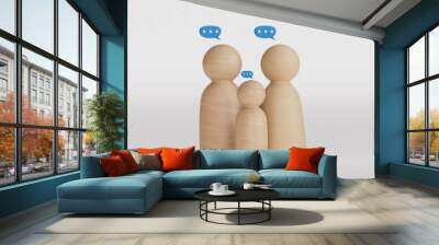 Family persons chatting together by wooden figure models on table. People lifestyle and relationship caring and understanding concept. Love conversation and communication theme.
 Wall mural