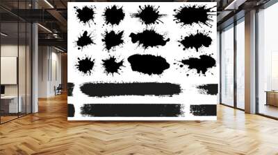 Set of paint splashes, brush strokes and construction rollers. Stains of splattered paint with smudges. Set of vector elements isolated on transparent background. Wall mural