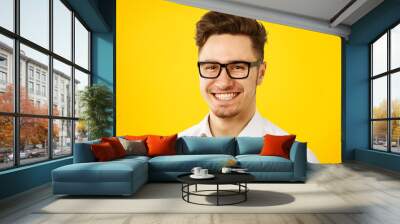 Funny young man wearing white shirt and glasses Wall mural