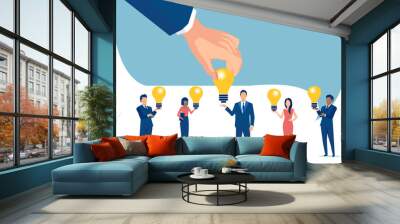 Vector of a business man hand picking idea light bulb from one of the company employees Wall mural