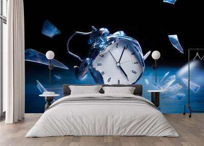 broken alarm clock with shattered glass on a dark background Wall mural