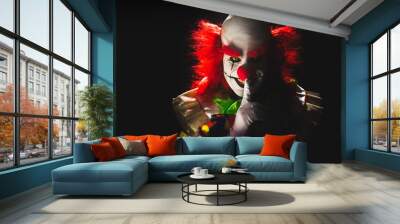 Scary clown on a dark background Wall mural