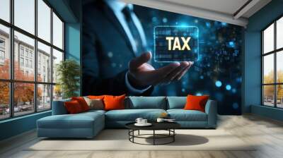 Taxation Concept: Businessman Holding a Hologram with the Word 'Tax' Wall mural