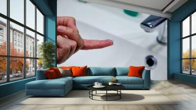 A woman's hands with a contact lens. Vision Correction and Health Care. Contact Lenses. Wall mural