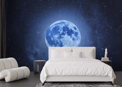 Blue Moon. Full moon. Super full moon. 19 August 2024. Super full moon with dark background. Moon. Supermoon. Blue super moon glowing with blue halo surrounded by small stars on black sky background. Wall mural