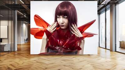 Cosplay, Japanese woman in costume of red plastic, modern and fu Wall mural