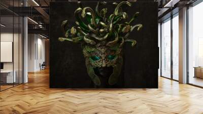 Head Medusa, creature of Greek mythology. pieces made by hand with goldsmiths and metals such as gold and copper. wears a helmet of green and gold snakes Wall mural