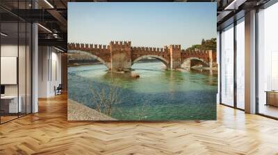 the bridge connects the new city to Castelvecchio di Verona, the stronghold of the Venetian capital with the adige river as a frame Wall mural