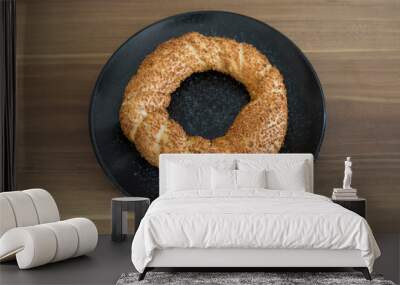 Turkish pastry products are Pogaca, Simit at patisserie on the wooden background. Wall mural