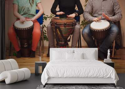 group of jambe drummers playing Wall mural