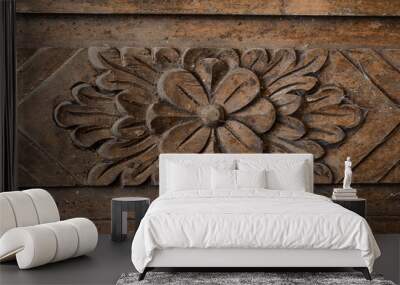 Pattern of flower carved on wood background Wall mural