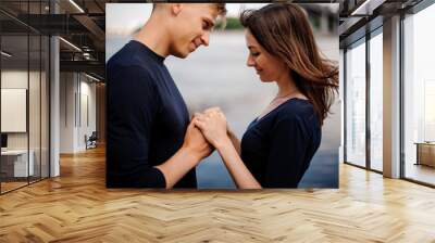 young lovers looking at each other Wall mural