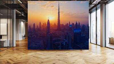 An aerial view of Dubai city bathed in the golden light of sunset. This panoramic perspective captures the sprawling urban landscape, highlighting Dubai's iconic skyscrapers and modern architecture.  Wall mural